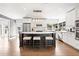 Bright kitchen featuring a center island, stainless steel appliances, and ample cabinet space at 6129 Leeland S St, St Petersburg, FL 33715