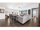 Large, bright open floor plan features an entertainment center, modern decor and access to the outdoor areas at 6129 Leeland S St, St Petersburg, FL 33715