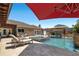 Relaxing outdoor space with a sun-drenched patio, comfortable chaise lounges, and a pristine pool for leisure at 6129 Leeland S St, St Petersburg, FL 33715