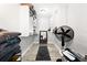 Walk-in closet with shelving, hanging storage, a rug, and a mirror at 6129 Leeland S St, St Petersburg, FL 33715