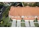 This aerial shot highlights the property's manicured lawns, private garages, and classic architectural details at 6303 Vista Verde E Dr, Gulfport, FL 33707