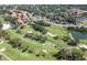 Lush golf course views surround this serene community, highlighted by mature trees and scenic ponds at 6303 Vista Verde E Dr, Gulfport, FL 33707