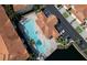 A bird's eye view showcasing the community pool, sun deck, and meticulously maintained landscaping, perfect for relaxation at 6303 Vista Verde E Dr, Gulfport, FL 33707