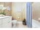 Inviting bathroom with bathtub, seashell decor, and ample counter space for a luxurious experience at 6303 Vista Verde E Dr, Gulfport, FL 33707