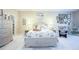 Inviting bedroom showcasing a coordinated design with a plush bed and ample natural light at 6303 Vista Verde E Dr, Gulfport, FL 33707