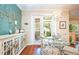 Charming dining room with designer lighting and a glass-top table with seating for four at 6303 Vista Verde E Dr, Gulfport, FL 33707