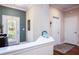 Welcoming entryway featuring elegant decor, a hallway and an exterior door to let natural light in at 6303 Vista Verde E Dr, Gulfport, FL 33707
