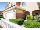 Charming two-story home with lush landscaping and attached garage at 6303 Vista Verde E Dr, Gulfport, FL 33707