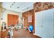 Home gym featuring workout equipment and storage at 6303 Vista Verde E Dr, Gulfport, FL 33707