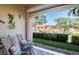 Lanai featuring outdoor seating with throw pillows and scenic views of the community at 6303 Vista Verde E Dr, Gulfport, FL 33707