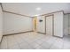 Spacious bonus room with neutral walls, and tile flooring at 6702 Towhe Dr, Seffner, FL 33584