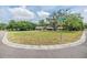 Beautiful home situated on a corner lot with a lush lawn and mature trees at 6702 Towhe Dr, Seffner, FL 33584