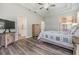 Spacious main bedroom suite with a trey ceiling and neutral decor at 7815 Blue Spring Dr, Land O Lakes, FL 34637