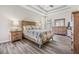 Large main bedroom suite with a trey ceiling and neutral decor at 7815 Blue Spring Dr, Land O Lakes, FL 34637