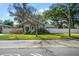 Charming single-story home with well-maintained front lawn and sidewalk at 905 E Hanna Ave, Tampa, FL 33604