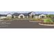 Well-manicured landscaping enhances the front of this traditional building with ample parking at 9766 Crescent Moon Dr, Riverview, FL 33578