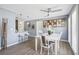 Cozy dining area with bar seating, stylish decor, and lots of natural light at 10115 Kenlake Dr, Riverview, FL 33578
