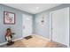 Bright foyer with neutral walls and wood-look tile flooring at 10115 Kenlake Dr, Riverview, FL 33578
