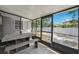 This screened in patio offers an outdoor dining space and access to the backyard at 10115 Kenlake Dr, Riverview, FL 33578