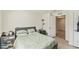 Bedroom features a closet and a window at 10463 Baylor Dr, Spring Hill, FL 34608