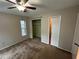 Bedroom featuring a ceiling fan, and a window at 1309 Malone Ave, Spring Hill, FL 34606