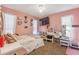 Bright bedroom with stylish decor, comfortable bed, and space-saving shelves at 1309 Malone Ave, Spring Hill, FL 34606