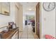 Neutral hallway leads to the outdoor patio through sliding glass doors at 1309 Malone Ave, Spring Hill, FL 34606