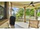 Enjoy outdoor dining on this spacious balcony with golf course and nature views at 1341 Marinella Dr, Palm Harbor, FL 34683