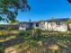 Backyard with a fence and screened in porch at 1408 Maybury Dr, Holiday, FL 34691