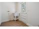 Laundry room features a white sink and access door to the exterior at 14903 Winterwind Dr, Tampa, FL 33624