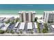 Aerial view of building on beach with beach access, parking, and beautiful ocean views at 15400 Gulf Blvd # 202, Madeira Beach, FL 33708