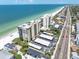Aerial view showcasing the condo community along the beach and Gulf of Mexico at 15400 Gulf Blvd # 202, Madeira Beach, FL 33708