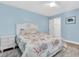 Bright bedroom with large bed and decorated with seashells, next to the closet at 15400 Gulf Blvd # 202, Madeira Beach, FL 33708