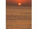 Sunset view reflecting on the sea at 15400 Gulf Blvd # 202, Madeira Beach, FL 33708