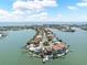 Island aerial view of the neighborhood with waterfront access and beautiful bay views at 16353 Redington Dr, Redington Beach, FL 33708