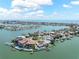 Waterfront homes featuring docks and island community from above at 16353 Redington Dr, Redington Beach, FL 33708