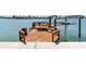 The expansive dock provides ample space for relaxation, fishing, and enjoying the peaceful waterfront setting at 16353 Redington Dr, Redington Beach, FL 33708