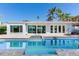 A refreshing pool and patio area, perfect for enjoying sunny days and outdoor relaxation with waterfront views at 16353 Redington Dr, Redington Beach, FL 33708