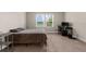 Bedroom featuring a double window, neutral walls, and carpeted flooring at 1969 Milkweed Trce, Lutz, FL 33558