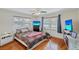 Bright bedroom with hardwood floors and lots of natural light at 1984 Trotter Rd, Largo, FL 33774