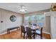 Comfortable dining area with table, chairs and bench seating, bathed in natural light at 1984 Trotter Rd, Largo, FL 33774