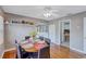 Dining room with dark wood table, decorative shelving and seating for five at 1984 Trotter Rd, Largo, FL 33774