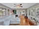 Spacious living room with hardwood floors, a neutral color scheme, and plenty of natural light at 1984 Trotter Rd, Largo, FL 33774