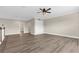 Bright living room offers hardwood floors and recessed lighting, creating an open and inviting space at 21878 Amelia Rose Way, Land O Lakes, FL 34637