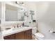 Clean bathroom features a modern vanity, mirror, and decorative touches at 22396 Nyack Ave, Port Charlotte, FL 33952
