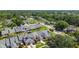 Picturesque aerial view of the community, highlighting the homes and the lush greenery around the neighborhood at 232 Hunter Ct, Palm Harbor, FL 34684