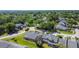 Aerial shot of the villas and mature landscaping in a desirable community, with easy access to nearby roads at 232 Hunter Ct, Palm Harbor, FL 34684