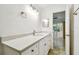 Bathroom featuring a large vanity with quartz countertop and tile flooring at 232 Hunter Ct, Palm Harbor, FL 34684