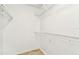 Walk-in closet with shelving for easy organization and storage at 232 Hunter Ct, Palm Harbor, FL 34684