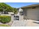 Charming villa features a one-car garage, a private gated courtyard, and lush landscaping in a desirable community at 232 Hunter Ct, Palm Harbor, FL 34684